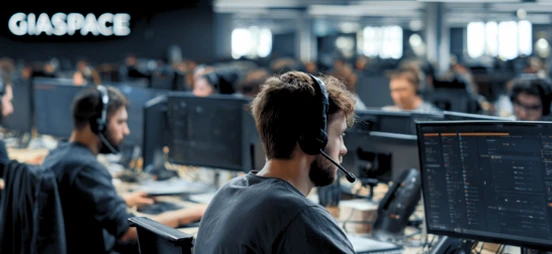 Multiple Staff Working at Computer Desks